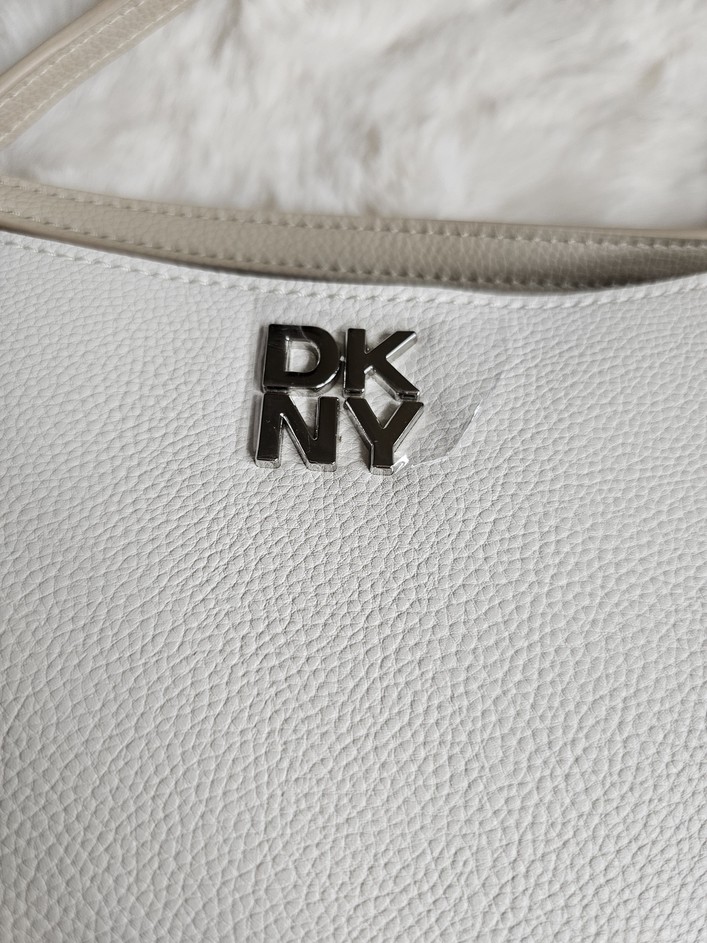 DKNY White Pebbled Leather Shoulder Bag - Sleek Silver Logo